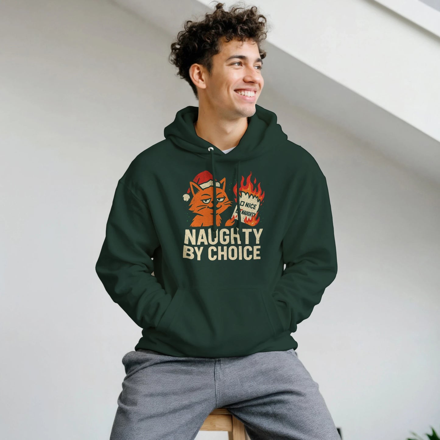 Person wearing the Naughty By Choice hoodie, showing relaxed fit and confident casual streetwear style.